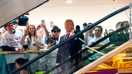 Trump rides an escalator to a press event to announce his candidacy for the presidency at Trump Tower in New York City in 2015.