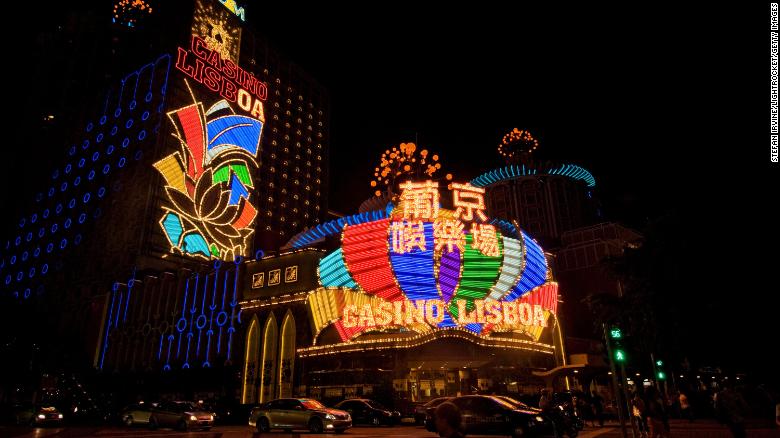 Macao shuts most businesses as Covid cases surge, but casinos stay open