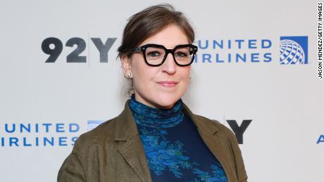 Mayim Bialik, here in April, is battling Covid-19.