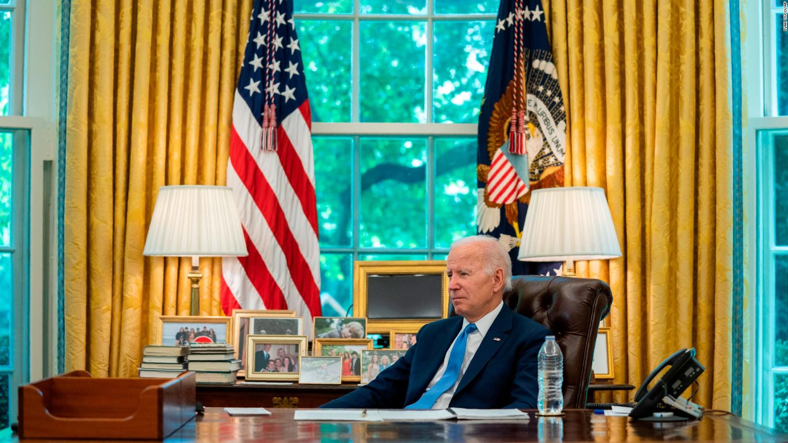FILE - President Joe Biden listens to a question during an interview with the Associated Press in the Oval Office of the White House, June 16, 2022, in Washington. Biden's top political advisers are bracing for big midterm losses in November. They know that the party holding the White House nearly always losses congressional seats in the first midterm election of a new presidency. (AP Photo/Evan Vucci, File)