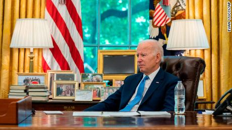 President Joe Biden listens to a question during an interview with the Associated Press in the Oval Office of the White House, June 16, 2022.