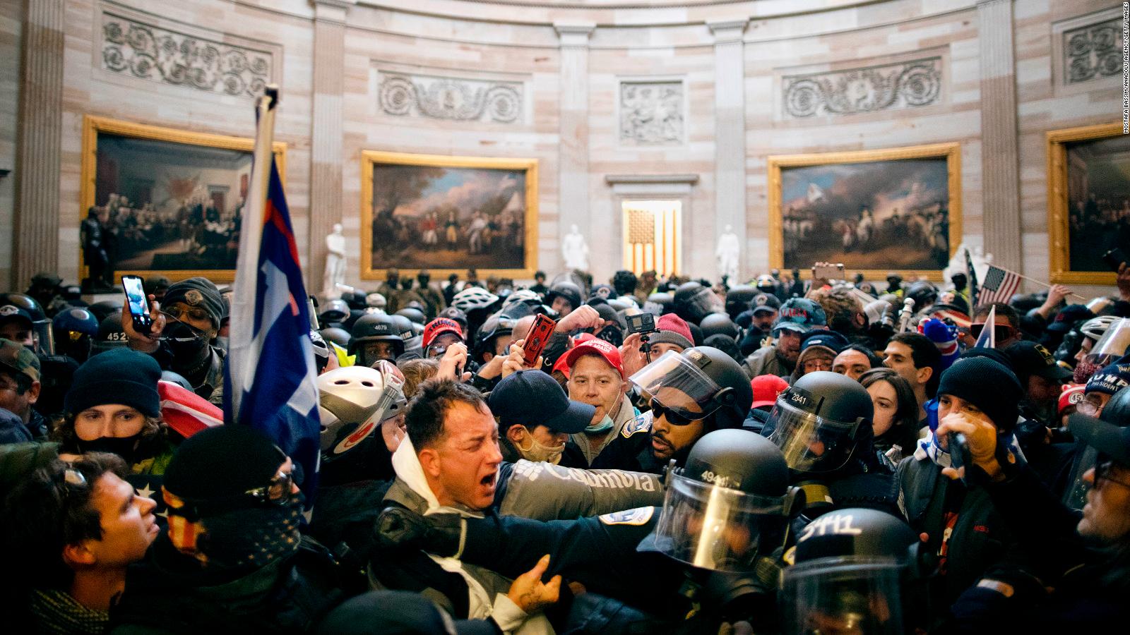 Police clash with supporters of US President Donald Trump who breached security and entered the Capitol building in Washington D.C., United States on January 06, 2021. Pro-Trump rioters stormed the US Capitol as lawmakers were set to sign off Wednesday on President-elect Joe Biden's electoral victory in what was supposed to be a routine process headed to Inauguration Day.