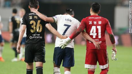 Son (M), Kim Ji-Soo (L) and Kim Young-Kwang (R) of Team K League during the friendly between Tottenham and Team K League.