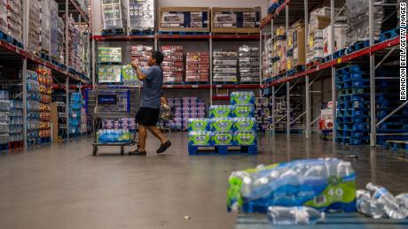 A customer stocks up on bottled water earlier this week in Houston, Texas.