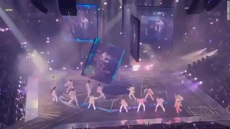 Giant screen hits dancers for boy band Mirror during Hong Kong concert