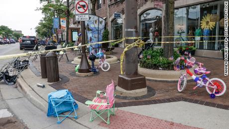 Chairs and bycycles lie abandoned after people fled the scene of a mass shooting at a 4th of July celebration and parade in Highland Park, Illinois.