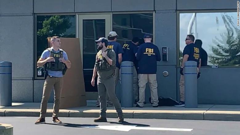Authorities are in a standoff with an armed suspect who tried to enter the FBI's Cincinnati office