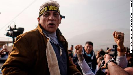 Former Army Major Antauro Humala, brother of former Peruvian President Ollanta Humala, greets his supporters after his release from the Piedras Gordas II prison in Ancon, Peru, on August 20, 2022. - Humala, brother of former President Ollanta Humala (2011-2016), was released early this Saturday after 17 years in prison for a rebellion that left six dead in 2005, and intends to be a presidential candidate. (Photo by Ernesto BENAVIDES / AFP) (Photo by ERNESTO BENAVIDES/AFP via Getty Images)