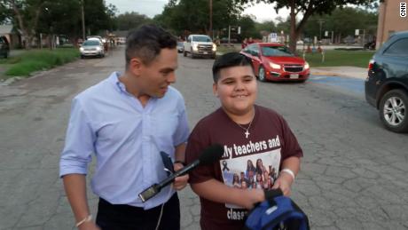 Uvalde boy shows exceptional resilience as he goes back to school with a smile on his face and photos of his massacred classmates on his chest