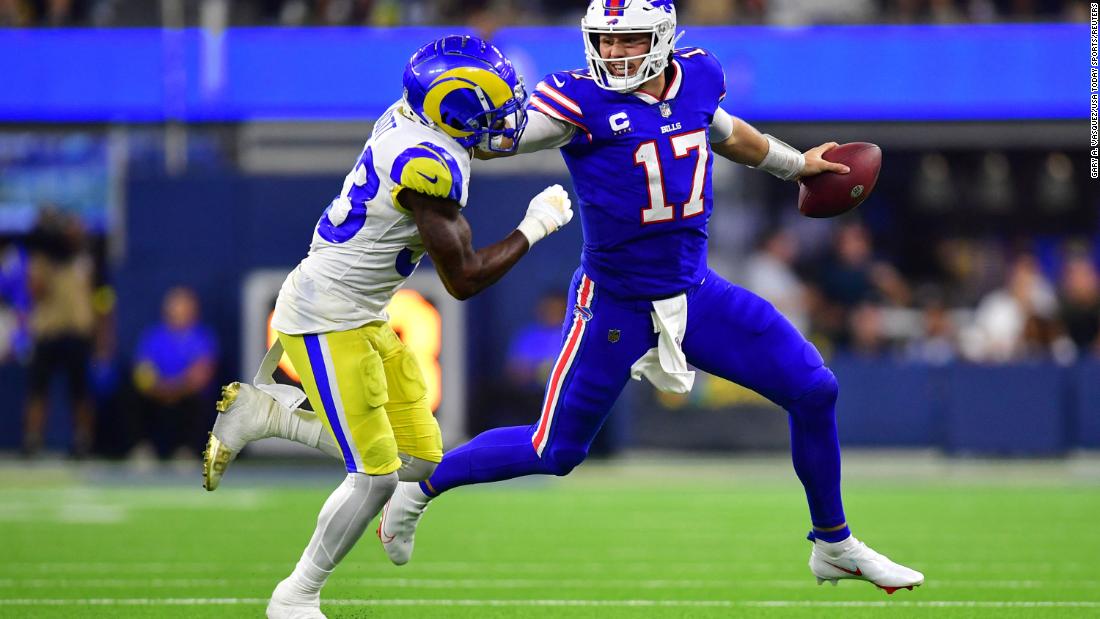 Buffalo Bills quarterback Josh Allen stiff-arms Los Angeles Rams safety Nick Scott in the third quarter of a massive 31-10 win against the defending Super Bowl champions at SoFi Stadium. The statement victory on NFL Opening Day shows the &lt;a href=&quot;http://www.cnn.com/2022/09/10/sport/nfl-team-popularity-buffalo-bills-spt-intl/index.html&quot; target=&quot;_blank&quot;&gt;Bills are serious contenders&lt;/a&gt; for the title in 2022.