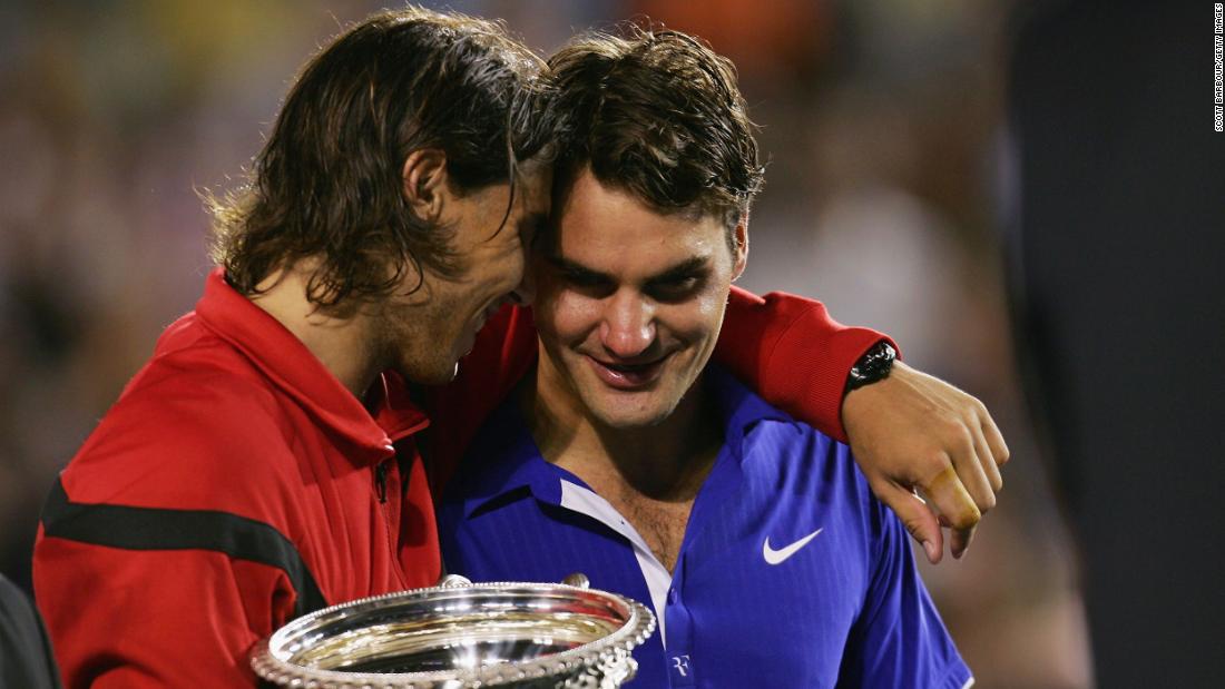 Nadal consoles Federer after defeating him in the 2009 Australian Open final. The two rivals pushed each other throughout the careers.
