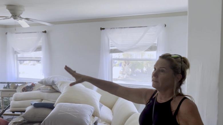 Watch a family return to their unrecognizable home after Hurricane Ian