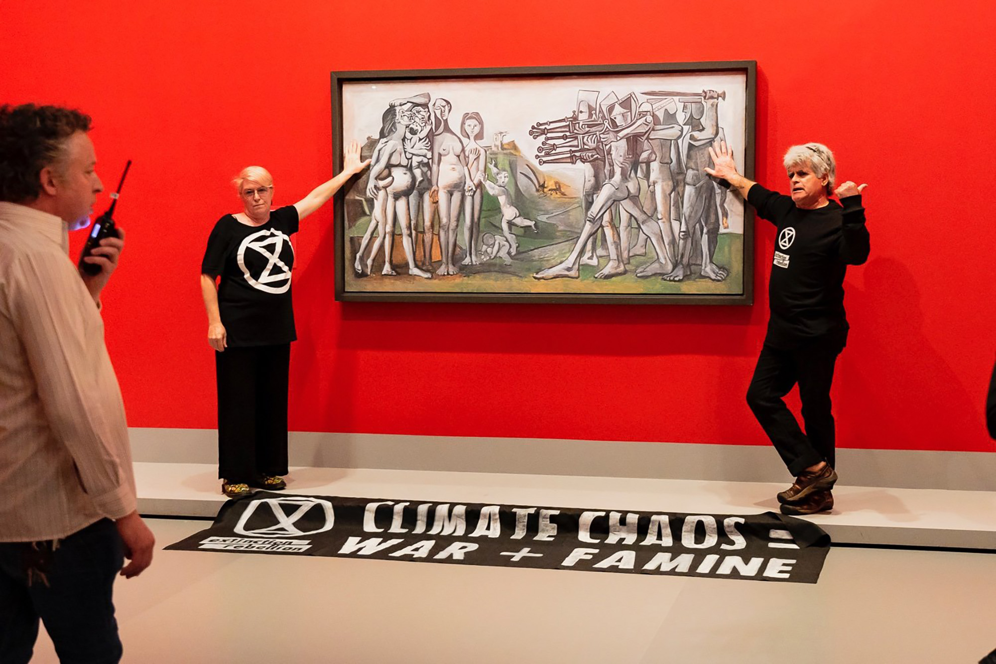 Australia: Extinction Rebellion activists glue themselves to Picasso  painting at the National Gallery of Victoria - CNN Style