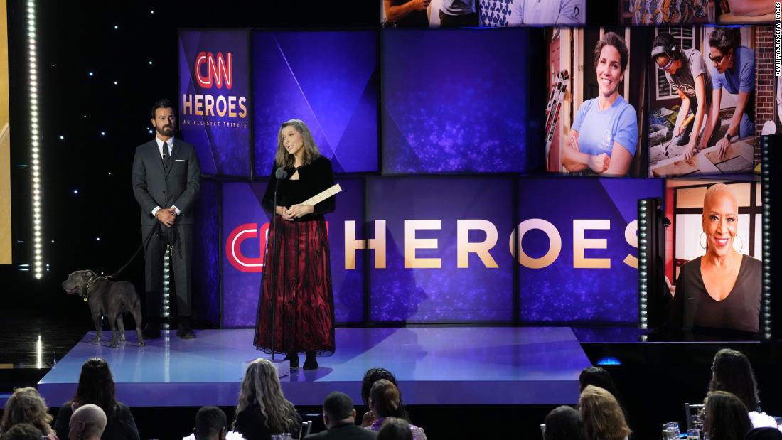CNN Hero Carie Broecker accepts her award from Justin Theroux.
