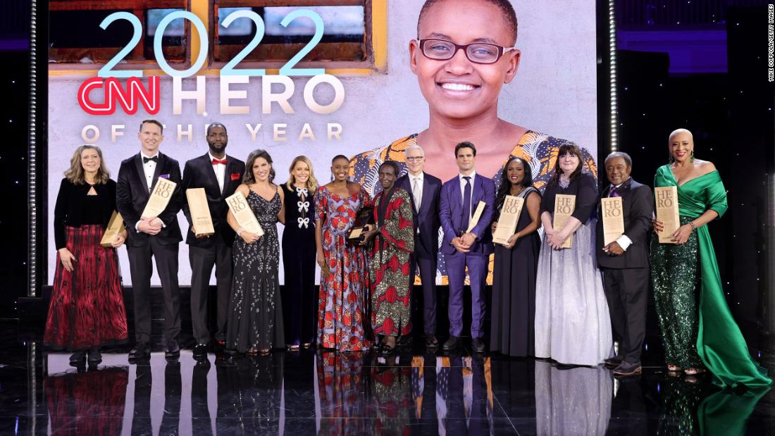 This year&#39;s CNN Heroes pose on stage with hosts Anderson Cooper and Kelly Ripa on Sunday, December 11. From left are Carie Broecker; Richard Casper; Tyrique Glasgow; Nora El-Khouri Spencer; Ripa; CNN Hero of the Year Nelly Cheboi; Cheboi&#39;s mother, Christina Cheboi Chebii; Cooper; Aidan Reilly; Meymuna Hussein-Cattan; Teresa Gray; Bobby Wilson; and Debra Vines.
