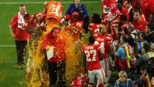 How can a head coach look on edge after winning the Super Bowl? It might be because he knows a cooler of energy drink is about to come splashing over his head. The "Gatorade shower" has become a tradition for marking big wins across various US sports, especially in the NFL's biggest game. Pictured, after a<a href="https://www.cnn.com/2020/02/02/us/chiefs-vs-49ers-super-bowl-liv/index.html" target="_blank"> long-awaited first winner's ring</a>, head coach Andy Reid finally got his first Gatorade bath when his Kansas City Chiefs defeated the San Francisco 49ers in 2020.