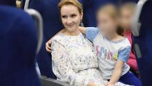 Russia's Commissioner for Children's Rights Maria Lvova-Belova pictured with what her office said are orphans from Donbas who have been sent to Russia's Nizhny Novgorod region. The image was released by Lvova-Belova's office in September. CNN obscured portions of this image to protect the identity of the children.