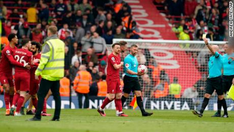 Robertson received a yellow card as the players walked off at the break.