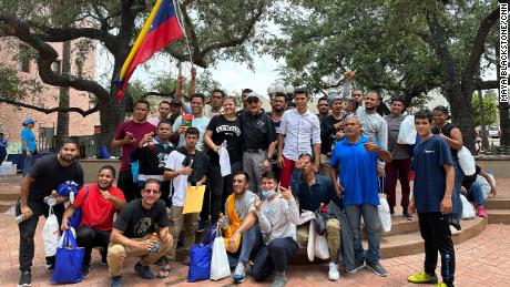 Pastor Carlos Navarro of Iglesia Batista West Brownsville poses with a group of Venezuelan migrants who&#39;ve just arrived in his city.