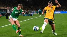 Ireland's Heather Payne, left, tries to cross the ball past Australia's Kyra Cooney-Cross. This was Ireland's first-ever match in a Women's World Cup.