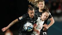 New Zealand's Ria Percival and Katie Bowen, in black, compete for the ball with Norway's Caroline Graham Hansen on July 20. New Zealand won the opening match 1-0. It was the country's first-ever win at a Women's World Cup.