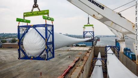 A turbine blade more than 300 feet long built for an offshore wind project at the New Bedford Marine Commerce Terminal in New Bedford, Mass., June 5, 2023. The offshore energy project will have turbines taller than any building in Boston, but they will be barely visible from Martha&#39;s Vineyard. (Bob O&#39;Connor/The New York Times)