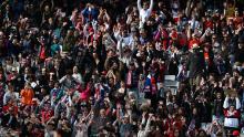 Fans cheer during the US-Vietnam match in Auckland, New Zealand.