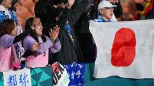 Japan supporters react following their team's emphatic victory over Zambia.