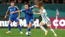 Italy's Giulia Dragoni is challenged by Estefania Banini of Argentina. At the age of 16, Dragoni became the <a href="https://edition.cnn.com/2023/07/24/football/giulia-dragoni-italy-argentina-womens-world-cup-spt-intl/index.html" target="_blank">youngest player</a> to represent Italy in the competition's history.