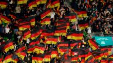 Germany fans celebrate as their team gets off to a great start.