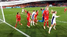 Switzerland players, in red, defend their box during a match against Norway on Tuesday, July 25. The match ended in a 0-0 draw.