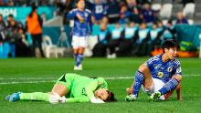 Costa Rican goalkeeper Daniela Solera is shaken up during a play against Japan. She was able to continue.