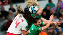 Canada's Vanessa Gilles competes for a header with Ireland's Niamh Fahey, bottom, and Louise Quinn during a match on Wednesday, July 26. <a href="https://www.cnn.com/2023/07/25/football/canada-spain-japan-2023-womens-world-cup-spt-intl/index.html" target="_blank">Canada won 2-1</a>.