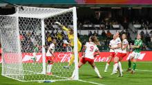 Canadian goalkeeper Kailen Sheridan can't get to a McCabe corner kick that went directly into the goal to give Ireland a 1-0 lead. The incredible "Olimpico" goal came in just the fourth minute of play.