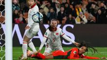 Portugal forward Jéssica Silva, right, watches a shot go wide during a match against Vietnam on July 27. Portugal won 2-0, eliminating Vietnam's hopes of advancing in the tournament.