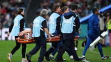 England's Keira Walsh is stretchered off after sustaining an injury. Walsh, England's midfield metronome, went down clutching her knee with no other player in her vicinity