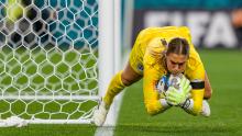 England goalkeeper Mary Earps makes a save against Denmark.