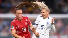 Denmark's Janni Thomsen, left, collides with England's Alex Greenwood.
