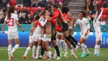 Morocco players celebrate their 1-0 win over South Korea on Sunday, July 30.