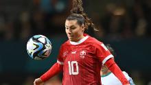 Switzerland's forward Ramona Bachmann controls the ball.