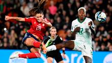 Costa Rica's Fabiola Villalobos, left, takes a shot at goal as Zambia's Racheal Kundananji attempts to block.