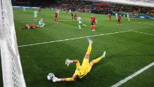 Canadian goalkeeper Kailen Sheridan makes a save against Australia. Canada was eliminated because of the loss and Nigeria's goalless draw against Ireland.