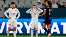 Vietnamese players Trần Thị Thu Thảo, left, and Dương Thị Vân react after the loss to the Netherlands.