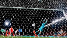 England's Rachel Daly, right, scores the sixth goal against China.