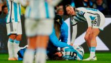 Argentina's Florencia Bonsegundo lies on the pitch after getting injured against Sweden.