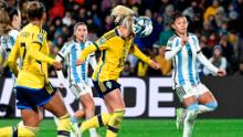 Sweden's Rebecka Blomqvist heads the ball for a goal against Argentina.