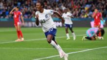 France's Vicki Becho celebrates after scoring her team's sixth goal against Panama on August 2. France won 6-3 to advance to the knockout stage.