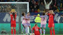 Japan's Risa Shimizu, third from left, celebrates with teammates after scoring in the 3-1 victory over Norway on August 5.