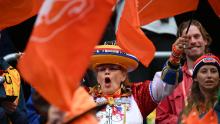 Fans of the Netherlands cheer before the start of the match against South Africa.