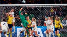 Naeher rises for a ball during the match against Sweden.